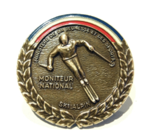 Médaille moniteur de ski diplômé.